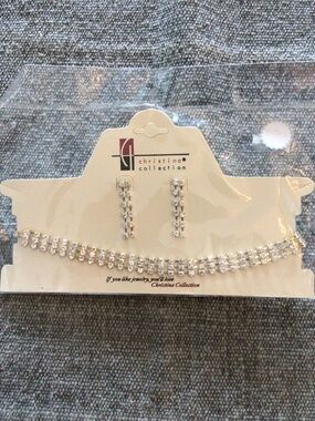 New in package rhinestone choker style necklace with matching pierced earrings